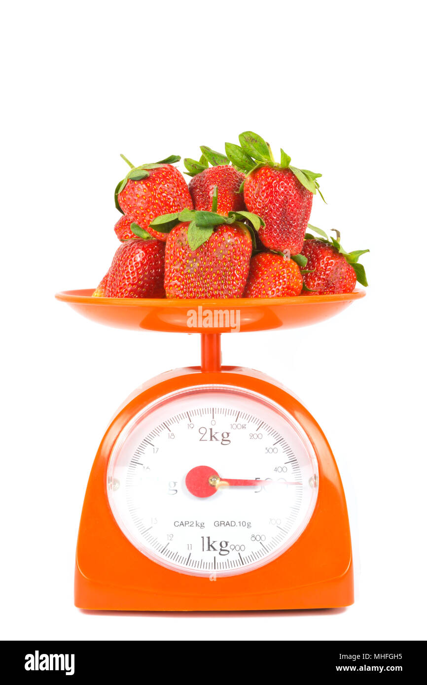 Strawberry On The Scales Stock Photo - Download Image Now - Weight Scale,  Food, Scale - iStock