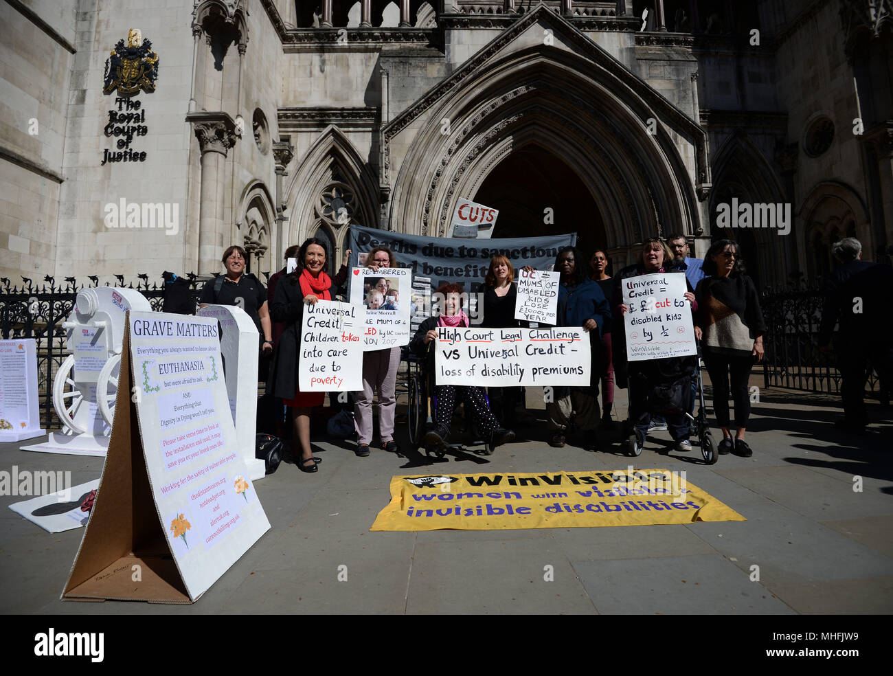 Disability rights campaigners outside the Royal Courts of Justice in London, where motor neurone disease sufferer Noel Conway is to begin an Appeal Court challenge against a 'blanket ban' on assisted dying. Stock Photo