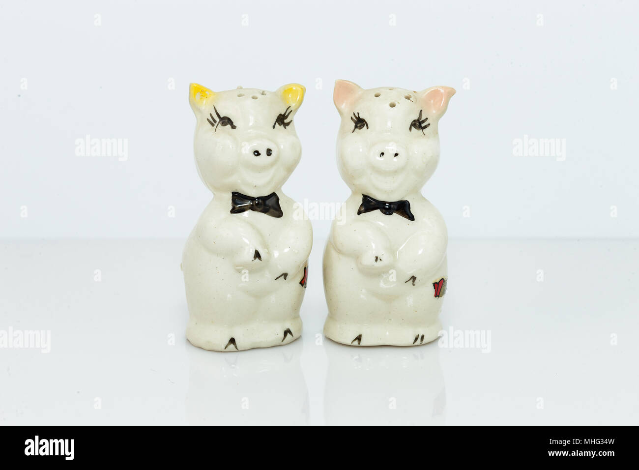 white ceramic pig salt and pepper shaker set Stock Photo