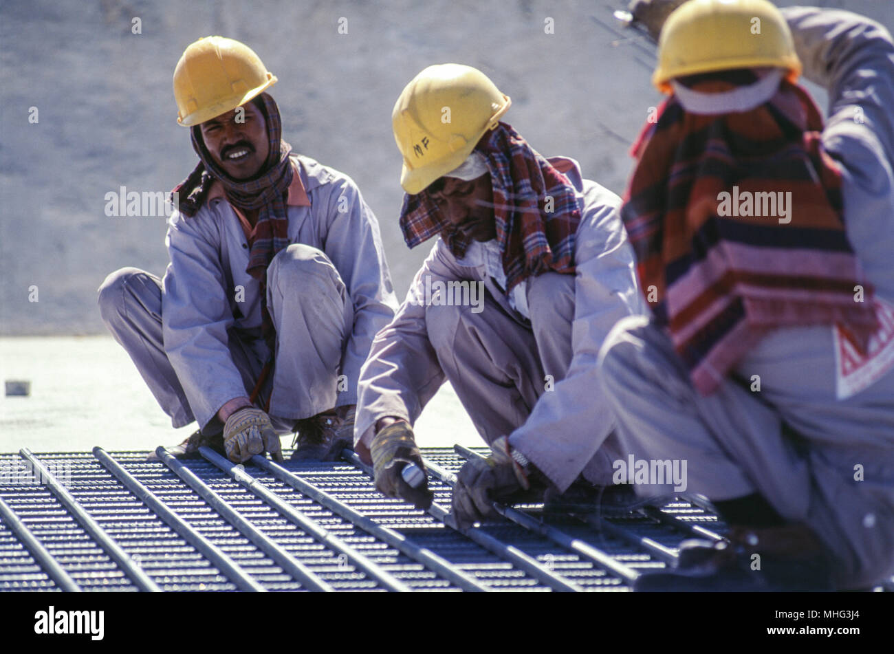 Foreign laborers at work on a construction project in central Riyadh. Stock Photo