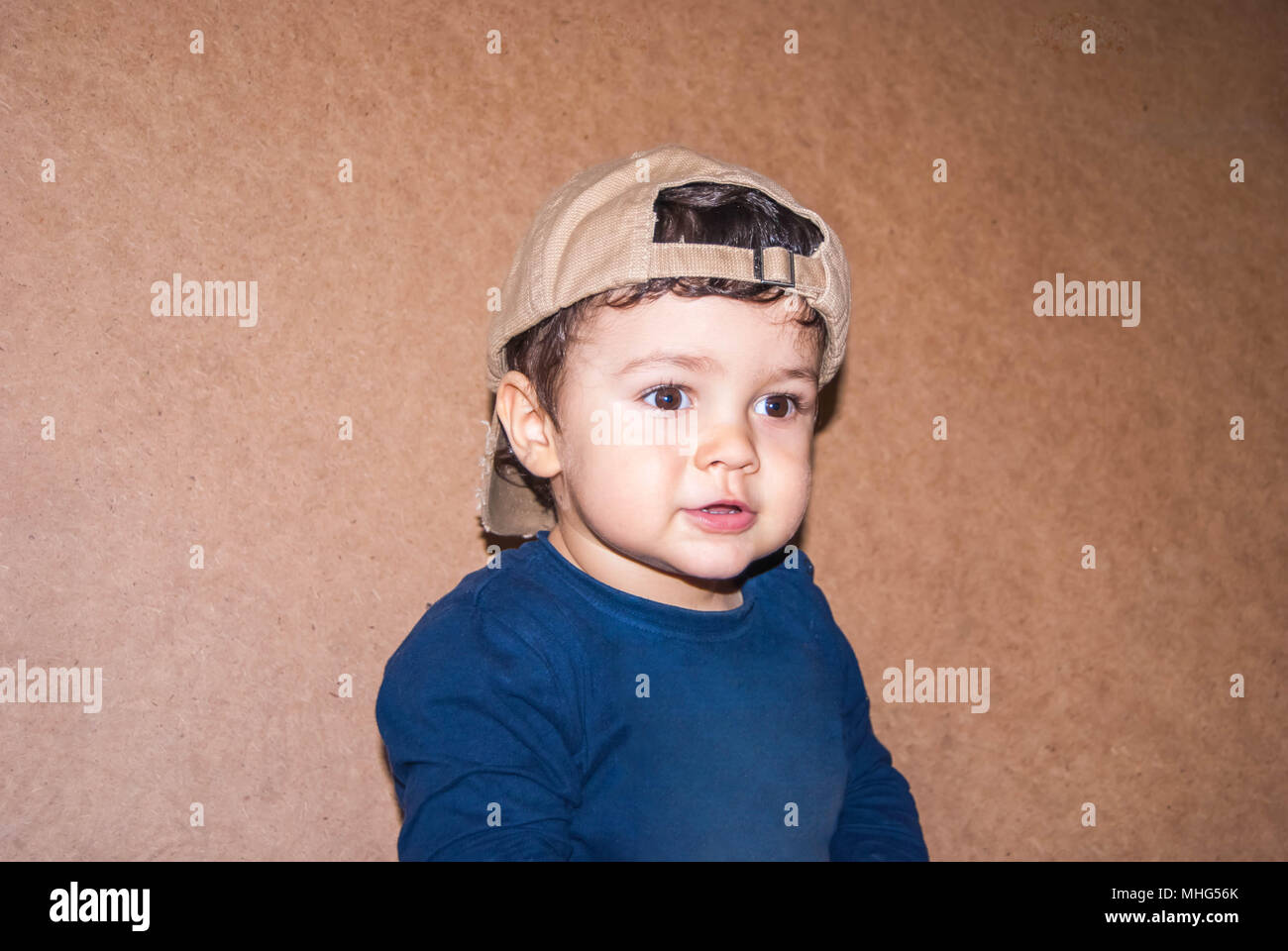cute little boy in a baseball cap Stock Photo Alamy