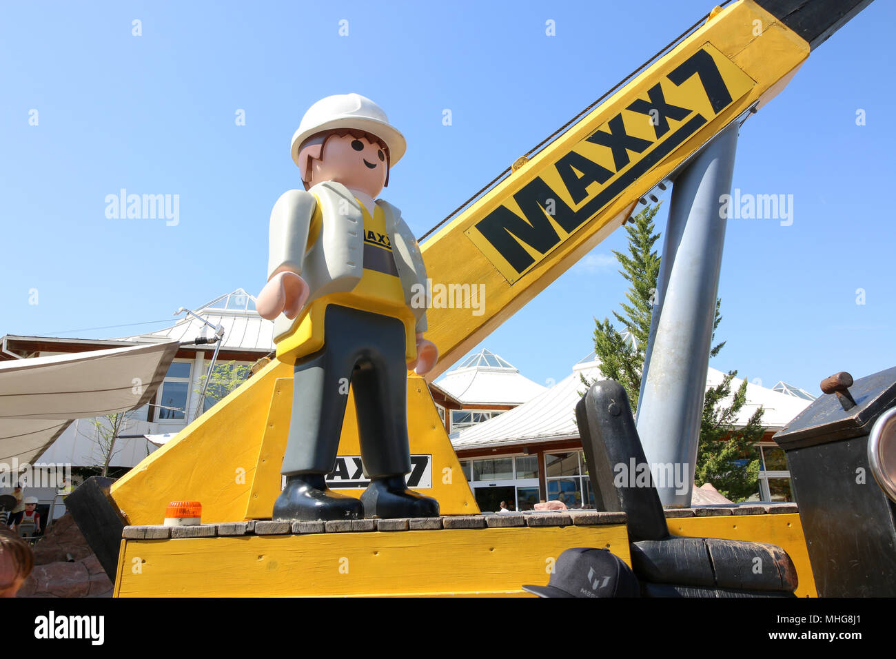 Zirndorf, Germany - April 29, 2018: An over-dimensional Playmobil  construction worker stands on a crane in the Playmobil Funpark in Zirndorf.  The them Stock Photo - Alamy
