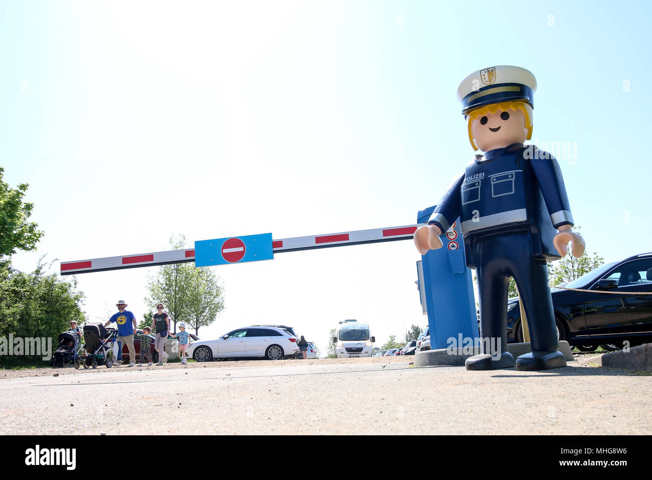 Zirndorf, Germany - April 29, 2018: An oversized Playmobil policeman guards  the parking lot of the Playmobil fan park in Zirndorf, Germany Stock Photo  - Alamy