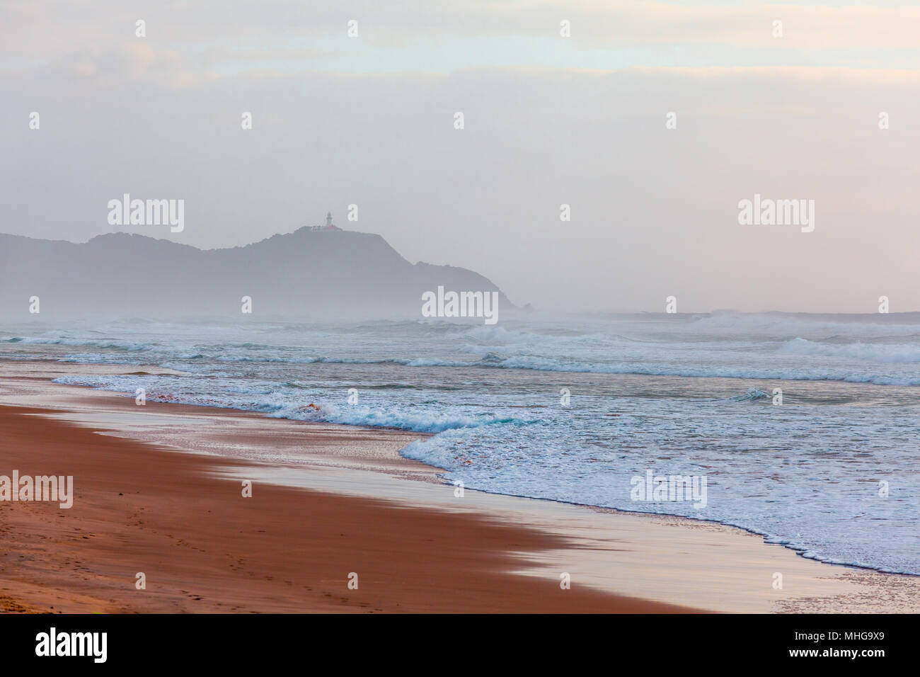 Byron Bay Lighthouse On A Cliff Disappearing In The Morning Mist Byron Bay New South Wales Australia Stock Photo Alamy