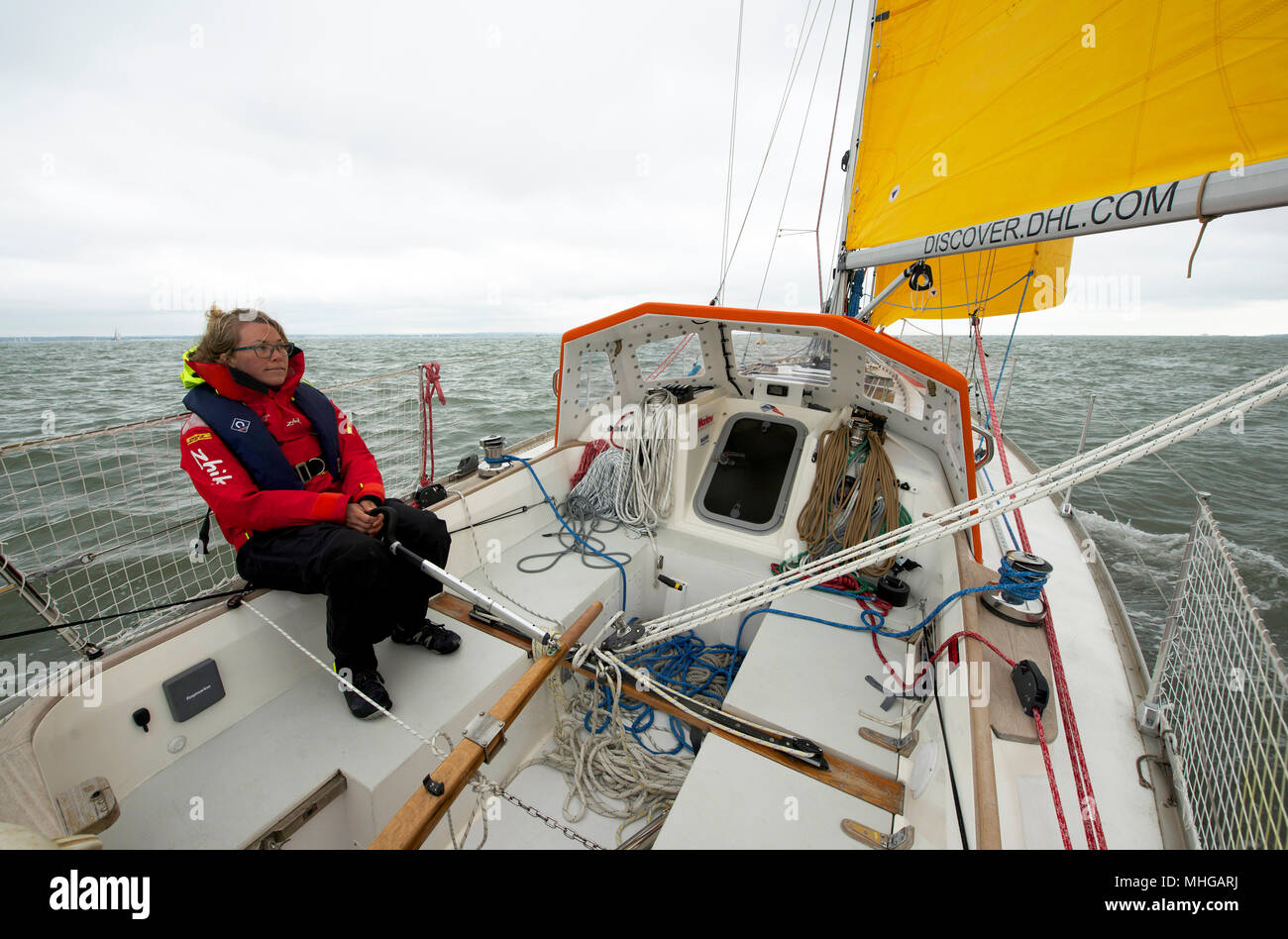 Susie Goodall sailing on her yacht DHL Starlight on the Solent, prior to sailing around the world singlehanded in the Golden Globe Race 2018. Stock Photo