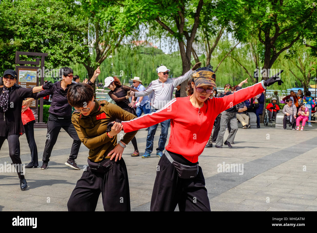 BEIJING, CHINA - APRIL 30, 2018: Dancing people in a park. Taoranting Park is a major city park located in Xicheng District in the southern part of Be Stock Photo