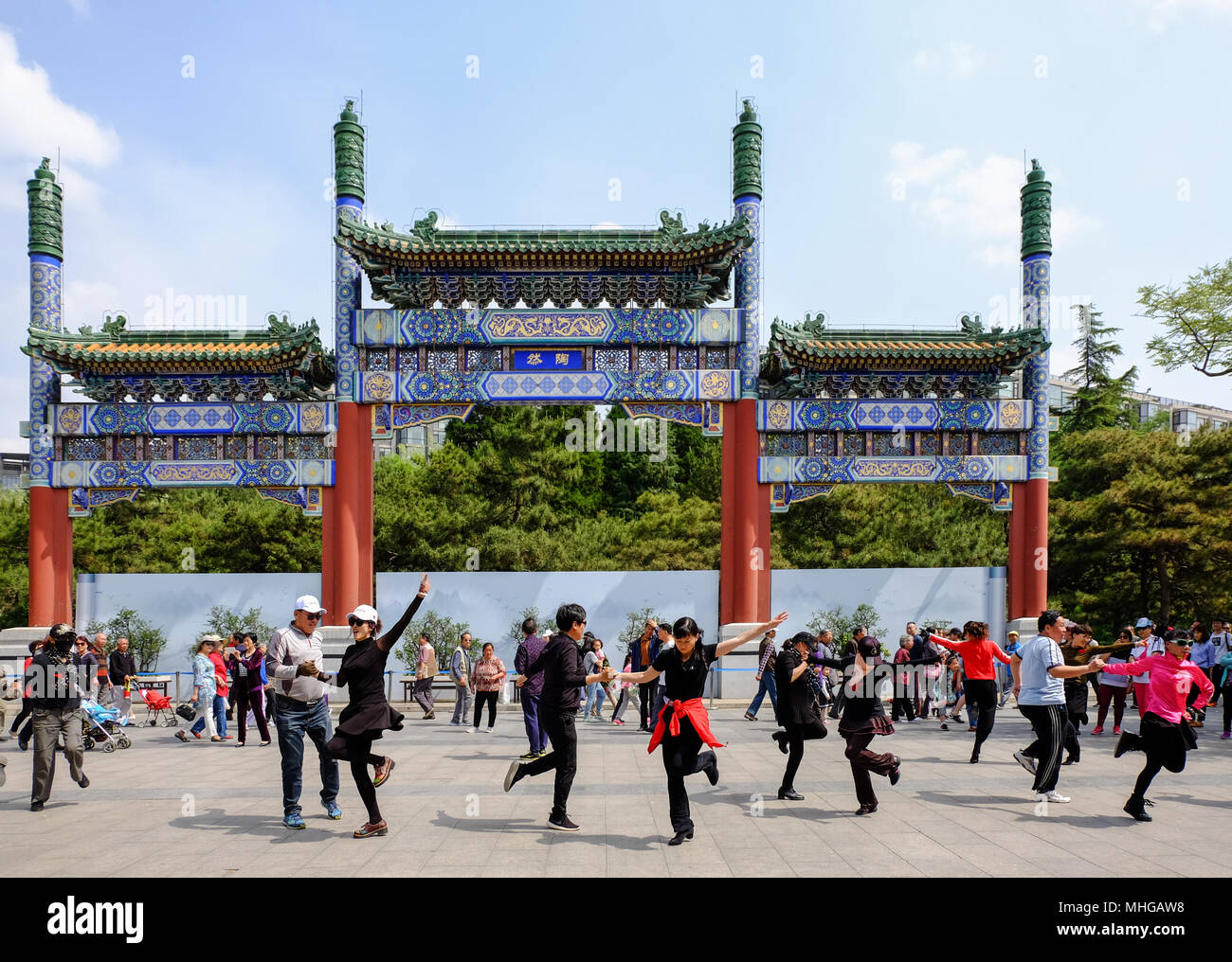 BEIJING, CHINA - APRIL 30, 2018: Dancing people in a park. Taoranting Park is a major city park located in Xicheng District in the southern part of Be Stock Photo