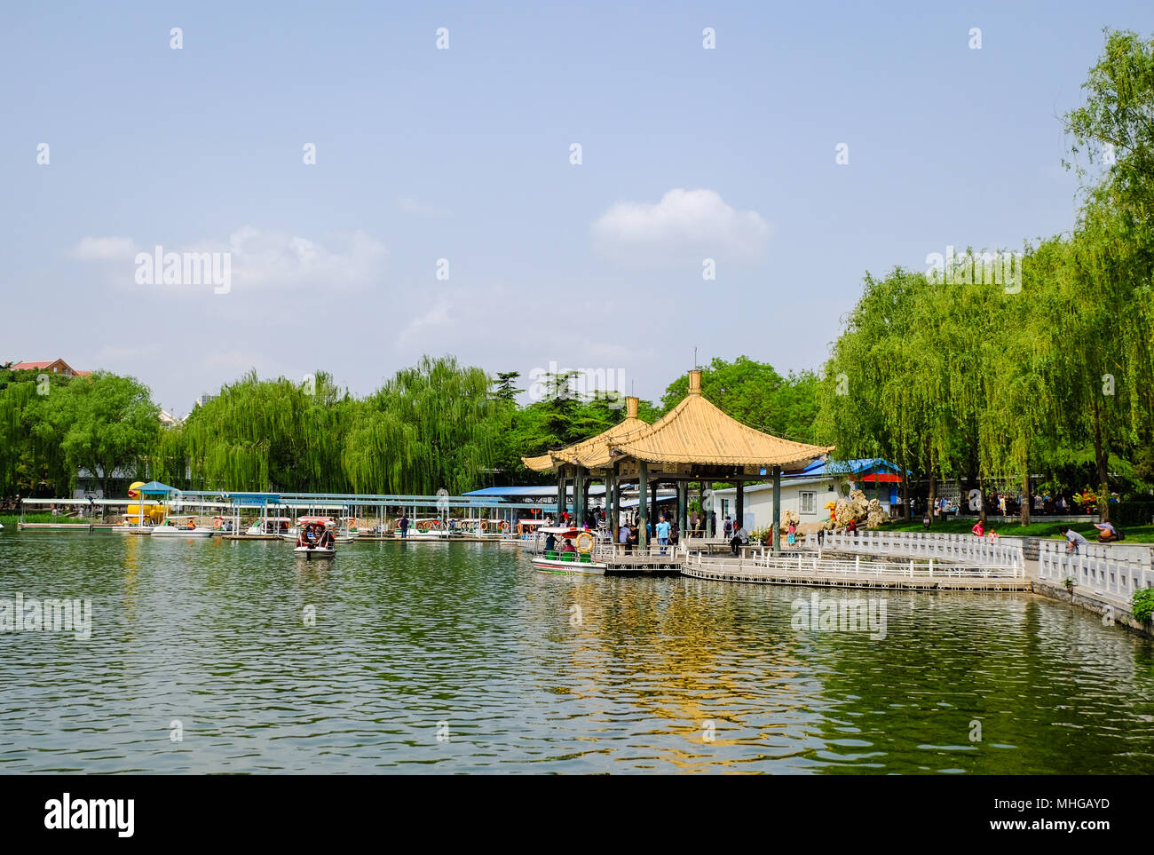 BEIJING, CHINA - APRIL 30, 2018: People are taking a recreational boat ride in a park. Taoranting Park is a major city park located in Xicheng Distric Stock Photo