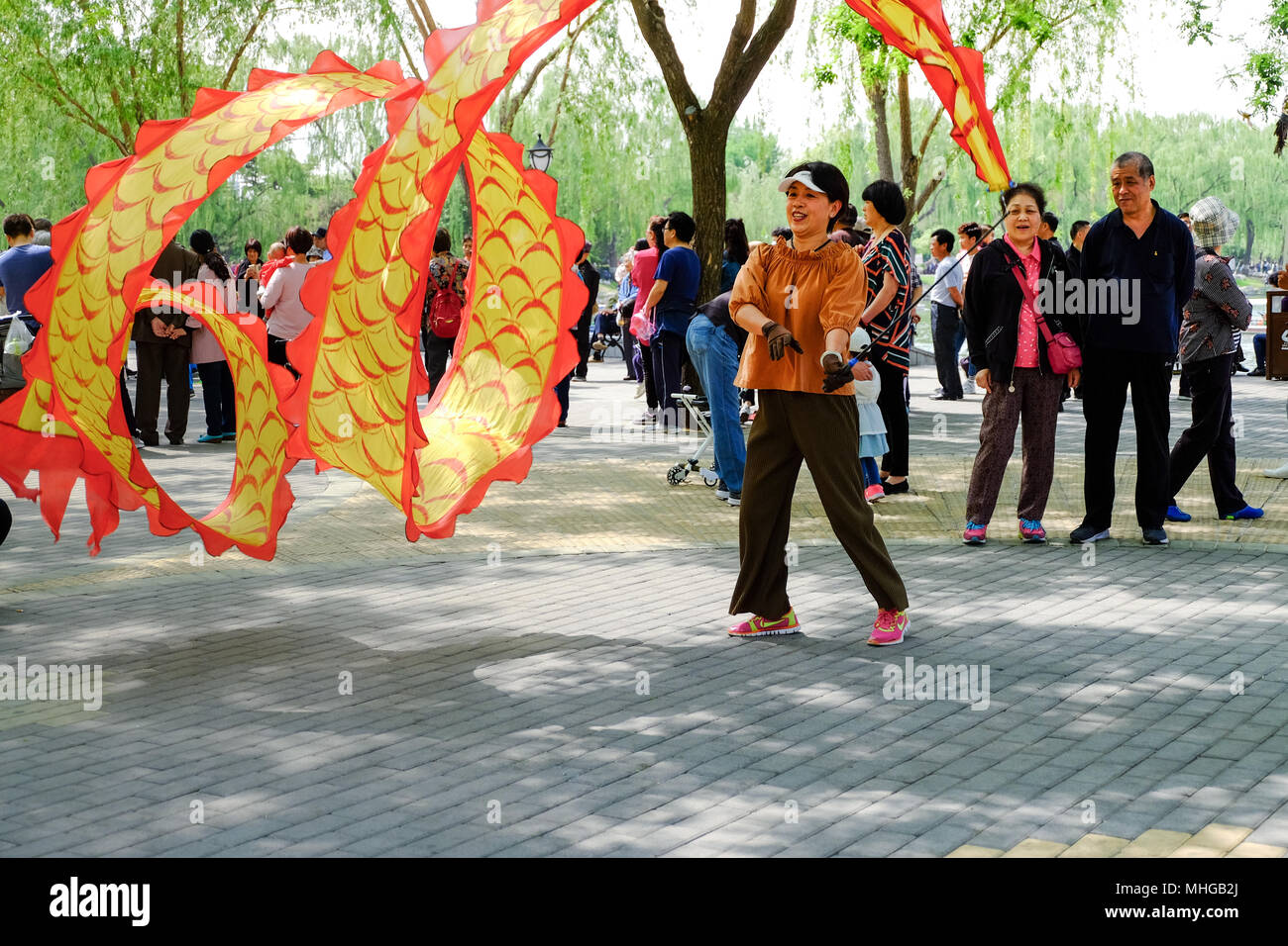 BEIJING, CHINA - APRIL 30, 2018: Traditional Chinese Silk Dance in a park. Taoranting Park is a major city park located in Xicheng District in the sou Stock Photo