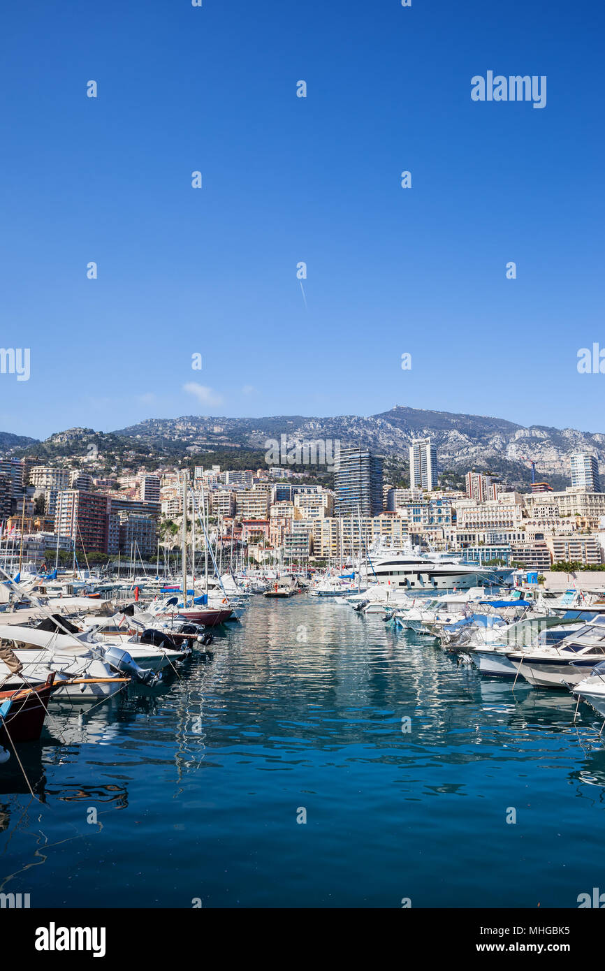 Monaco principality, yachts and boats at Port Hercule, Monte Carlo cityscape, Europe Stock Photo