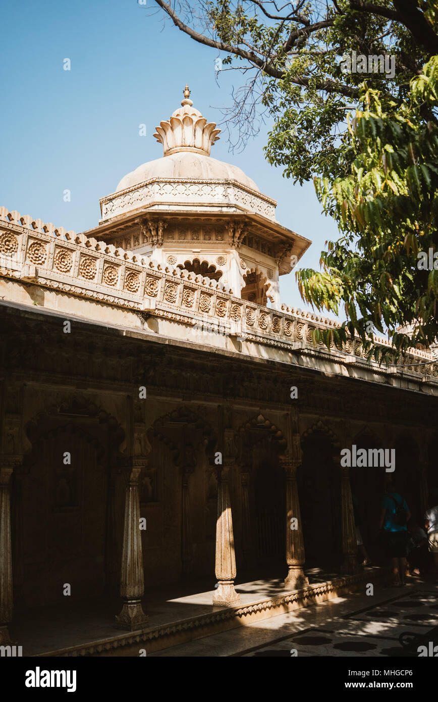 Ornate, gaudy and decorative city palace on a sunny day in Udaipur, India Stock Photo