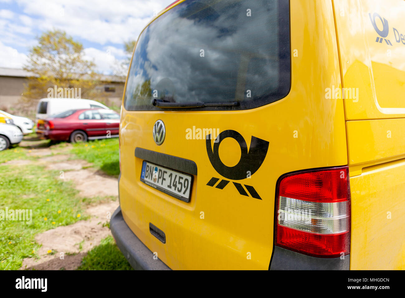 ALTENTREPTOW / GERMANY MAY 1, 2018: Transport vehicle Volkswagen T5 from Deutsche Post ( german post ) stands on a street. Stock Photo