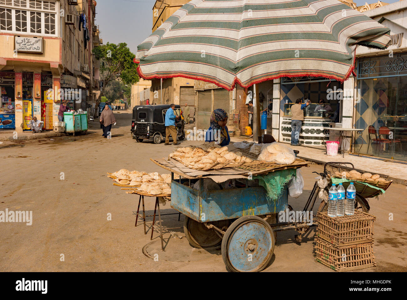 Bread seller in Giza, Cairo, Egypt at a crossroad close to the Pyramid