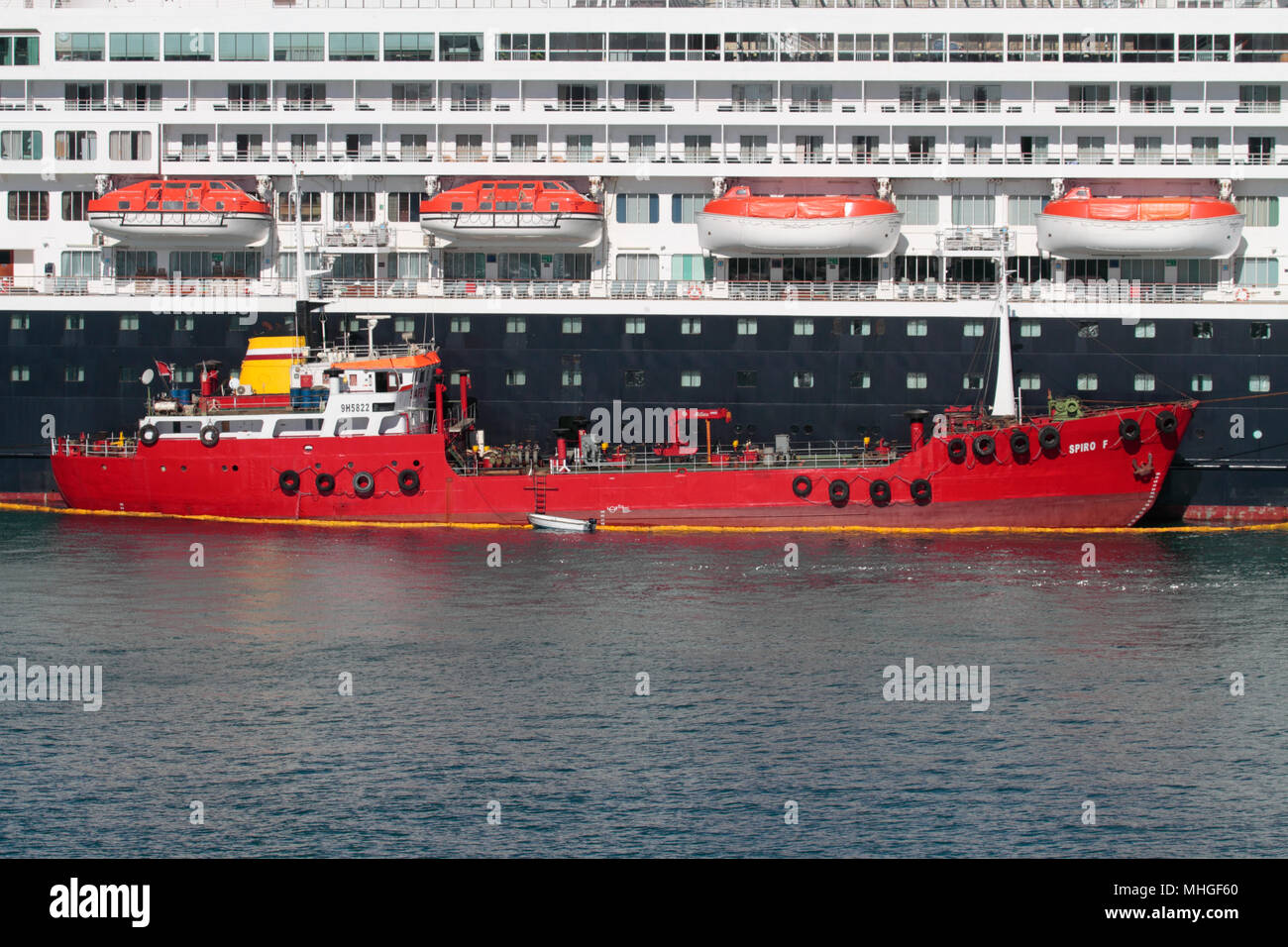The bunkering vessel Spiro F refuelling a cruise ship in Malta Stock Photo
