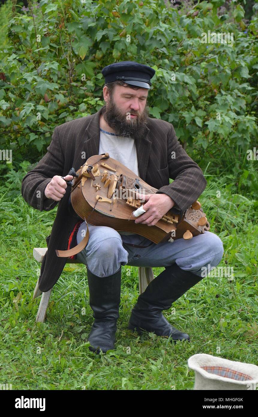 BLIND MUSICIAN AT MANDROGI VILLAGE, RUSSIA Stock Photo