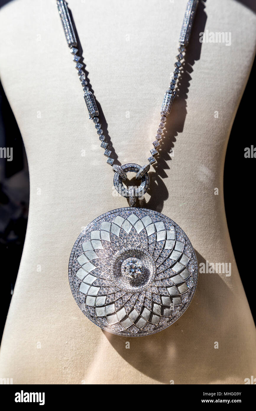 Diamond and white gold necklace in the display window of fine luxury jeweler Boucheron at their Bond Street store, London, UK Stock Photo