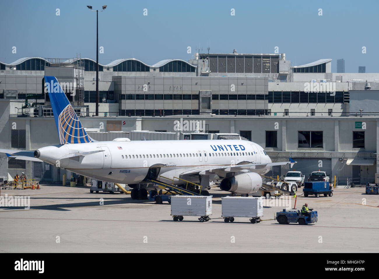United Airlines jet at a gate of Miami International Airport in Miami
