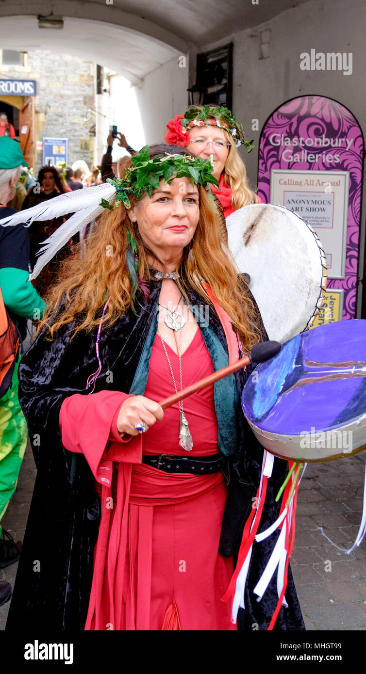 Glastonbury,UK. 1st May 2018.  Pagans and other celebrants of the Beltane festival gather in the streets of Glastonbury on the first day of May 2018.  The festival has pre christian roots and welcomes in the summer. ©JMF News / Alamy Live News Stock Photo