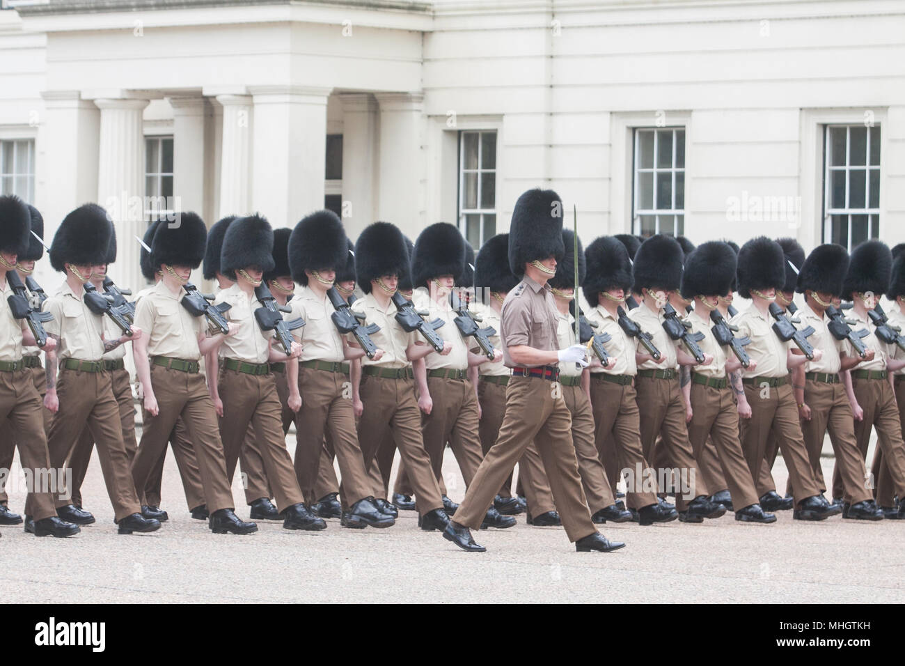 London UK. 1st May 2018. Members of the Scots Guards regiment of the Household Division  rehearsing at Wellington Barracks for Trooping the colour parade to mark Queen Elizabeth official birthday on 16 June. The Scots Guards were formed in 1642 by Archibald, 1st Marquis of Argyll on orders of King Charles I Stock Photo