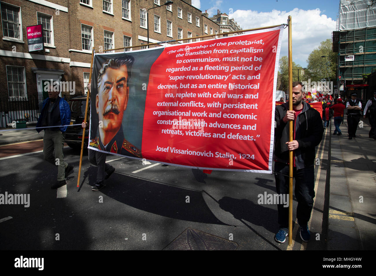 London, UK. 1st May, 2018. Communist Party of Great Britain during May Day celebrations in London, England, United Kingdom. Demonstration by unions and other organisations of workers to mark the annual May Day or Labour Day. Groups from all nationalities from around the World, living in London gathered to march to a rally in central London to mark the global workers day. Credit: Michael Kemp/Alamy Live News Stock Photo