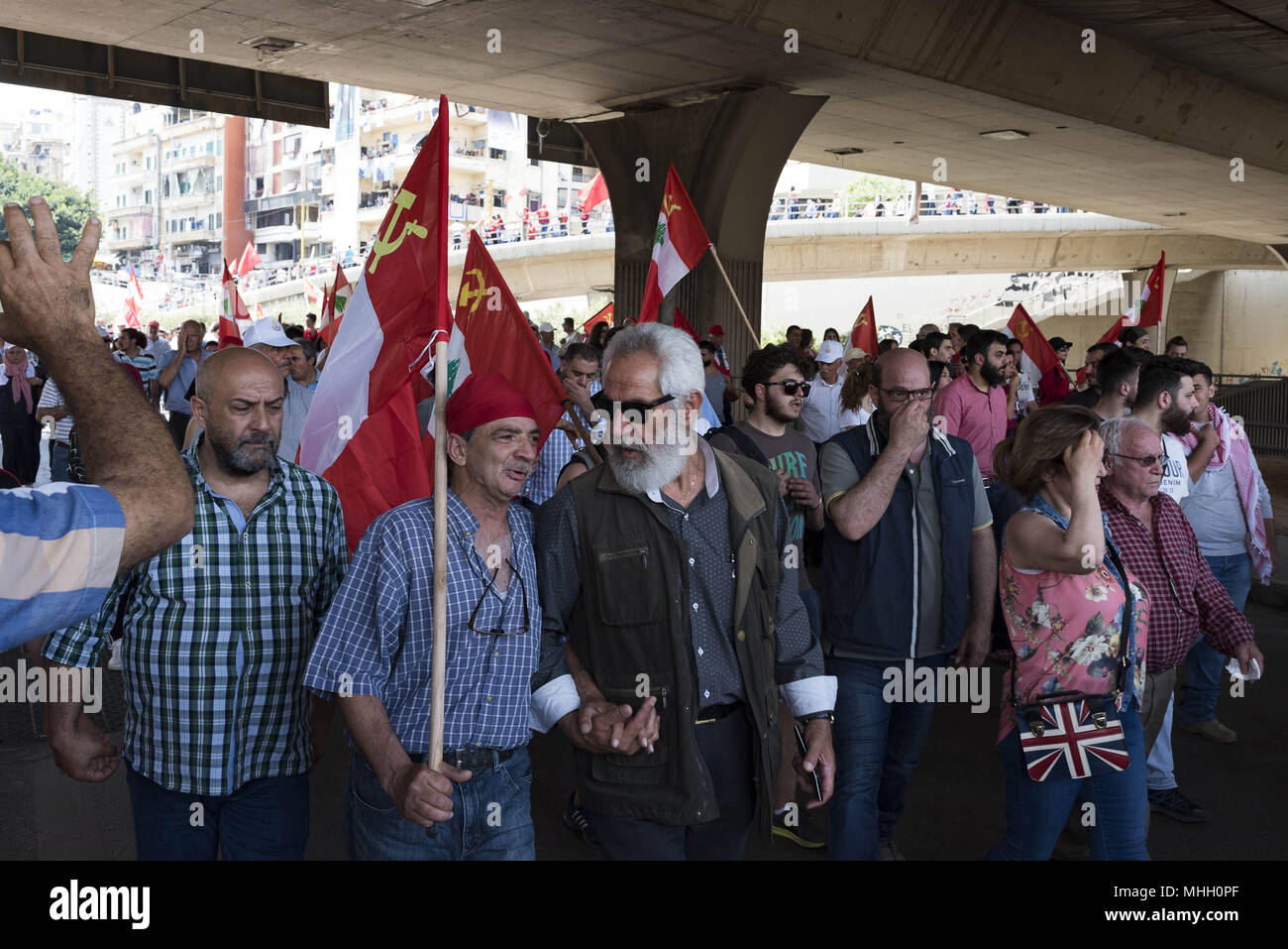 Beirut, Lebanon. 1st May, 2018. Members of the Lebanese Communist Party and other worker rights groups march in Beirut in celebration of International Workers' Day. Credit: Antoine Abou-Diwan/SOPA Images/ZUMA Wire/Alamy Live News Stock Photo