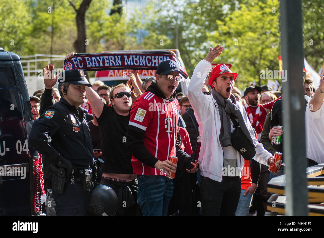 Madrid, Spain. 1st May, 2018. Bayern Munich fans in Santiago Bernabeu Stadium escorted by police ahead of Champions League match against Real Madrid, in Madrid, Spain. Credit: Marcos del Mazo/Alamy Live News Stock Photo