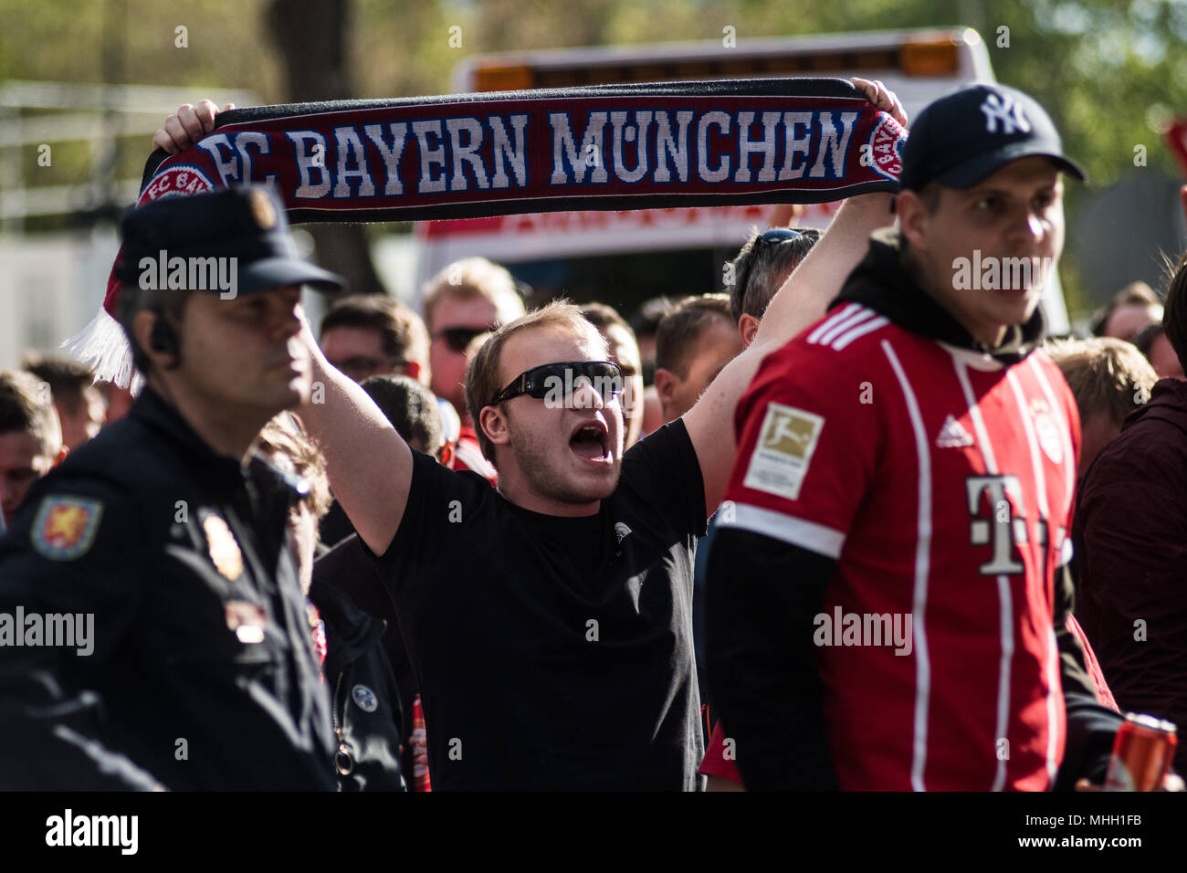 Madrid, Spain. 1st May, 2018. Bayern Munich fans in Santiago Bernabeu Stadium escorted by police ahead of Champions League match against Real Madrid, in Madrid, Spain. Credit: Marcos del Mazo/Alamy Live News Stock Photo