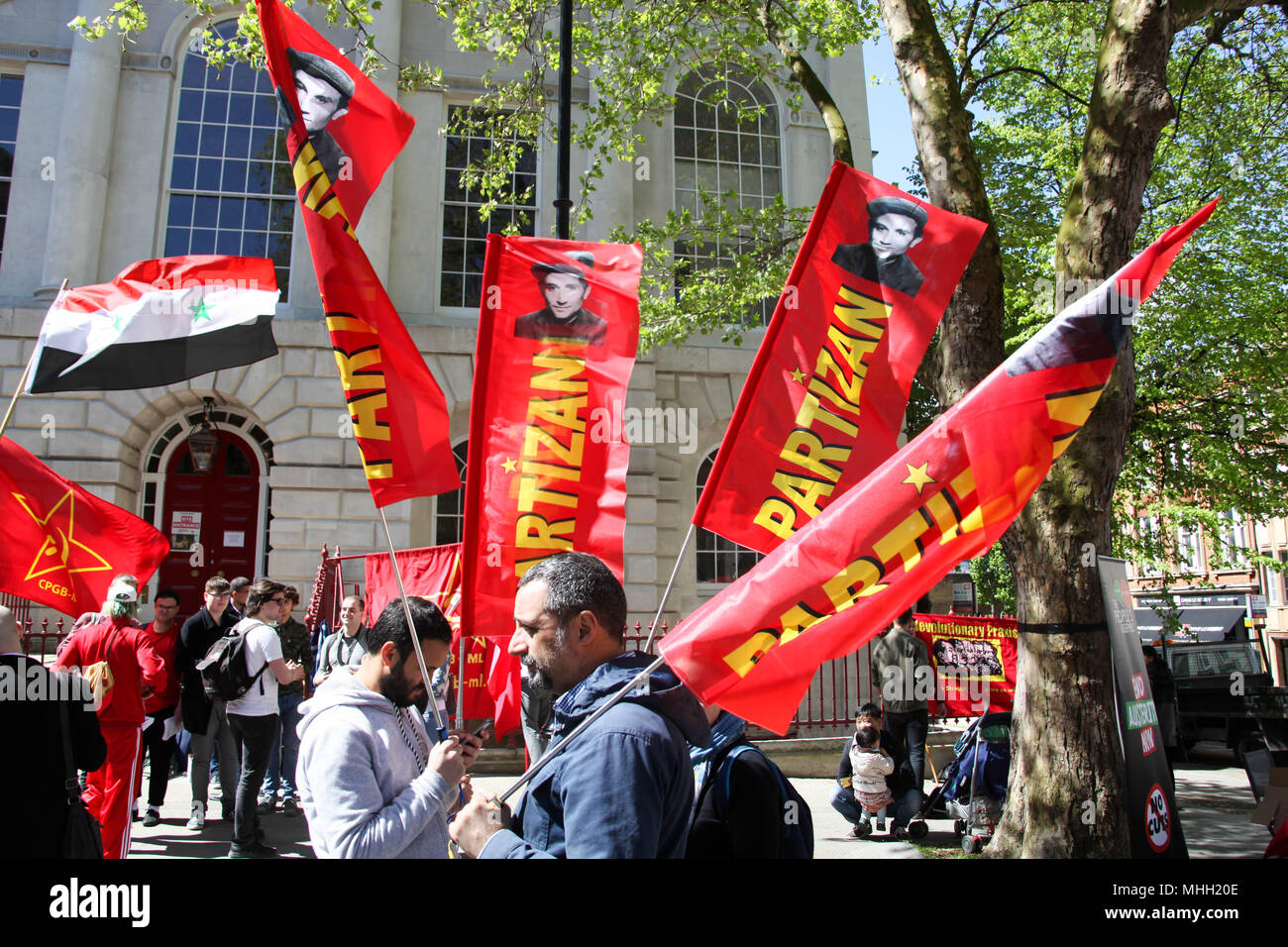 London, UK. 1st May 2018. Partizan Flags at Mayday In London Credit: Alex Cavendish/Alamy Live News Stock Photo