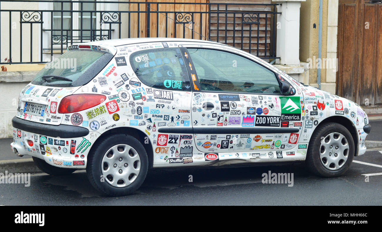 LE MANS, FRANCE - April 25, 2017: car stickers cover a white car Peugeot  Stock Photo - Alamy