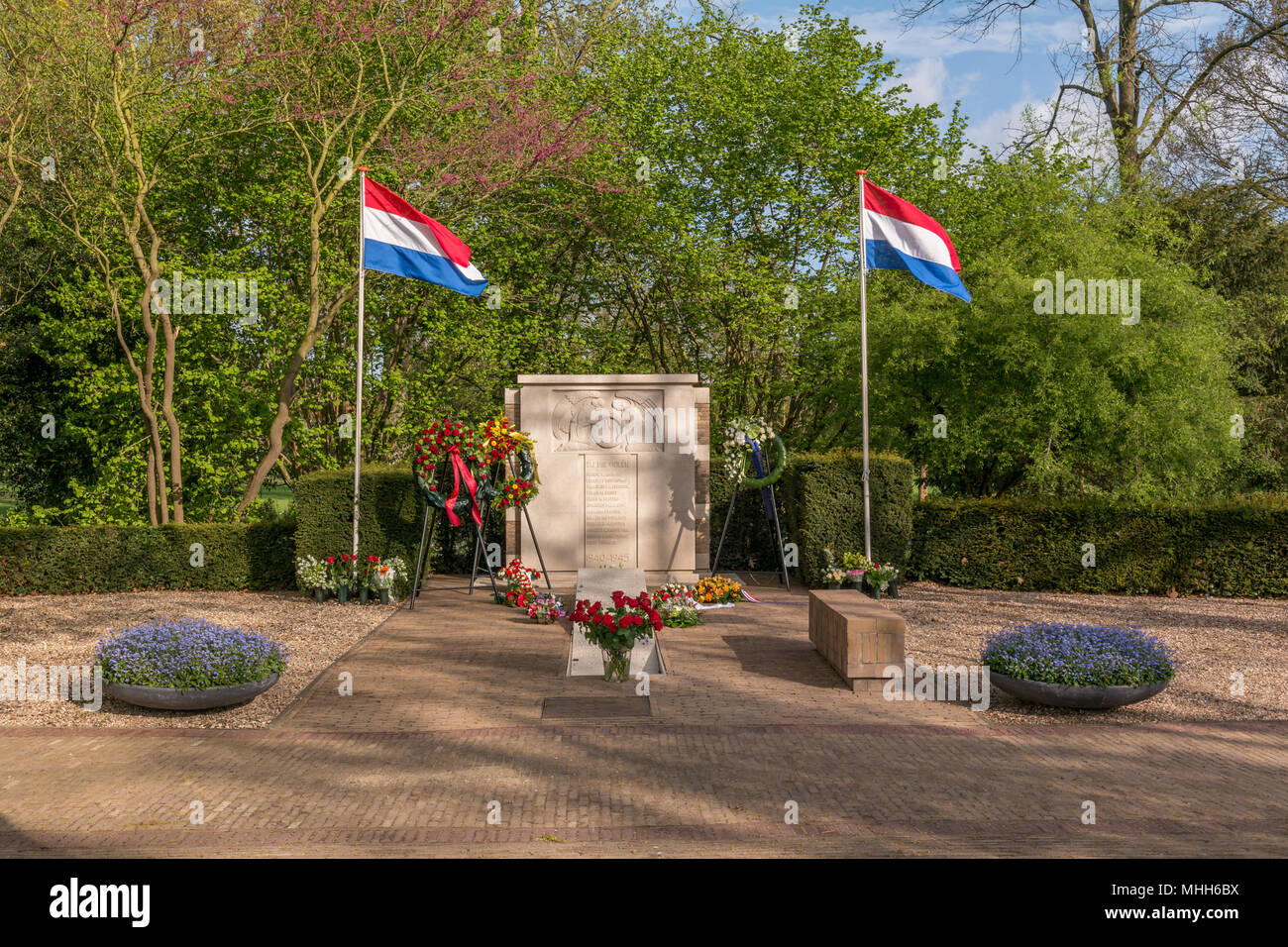 War Memorial in Voorschoten the morning after remembrance day on may 4th Stock Photo