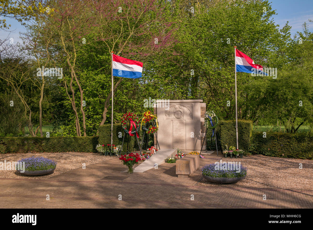 War Memorial in Voorschoten the morning after remembrance day on may 4th Stock Photo