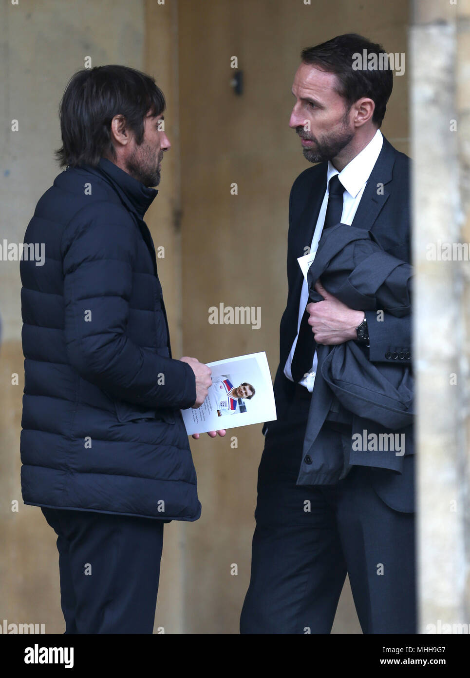 Antonio Conte and Gareth Southgate outside St Luke's and Christ Church, London, where the memorial service for former Chelsea player Ray Wilkins is being held. Wilkins, who began an impressive playing career at Stamford Bridge and also later coached them, died aged 61 following a cardiac arrest Stock Photo
