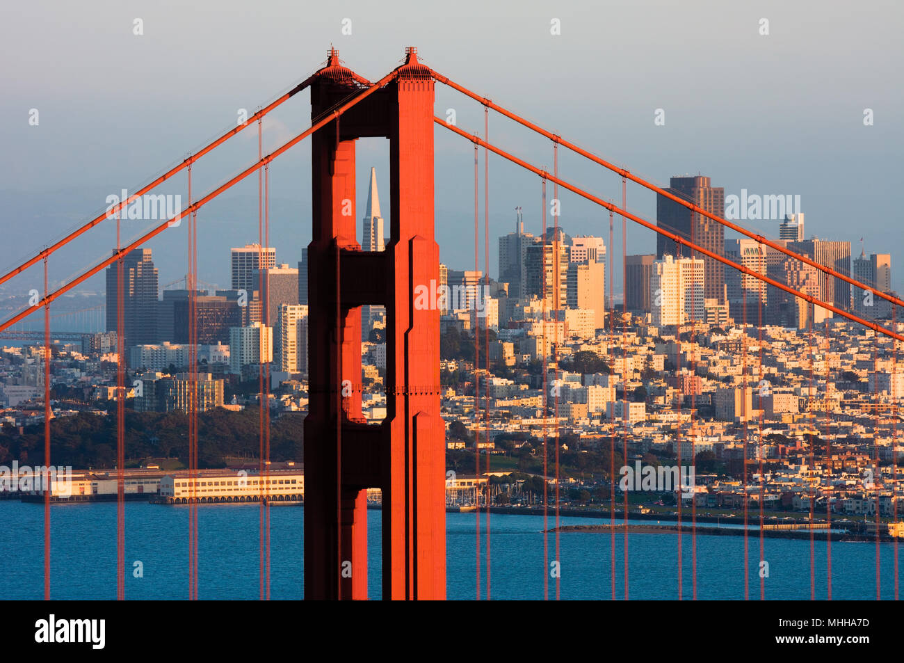 Golden Gate Bridge and downtown San Francisco at sunset Stock Photo