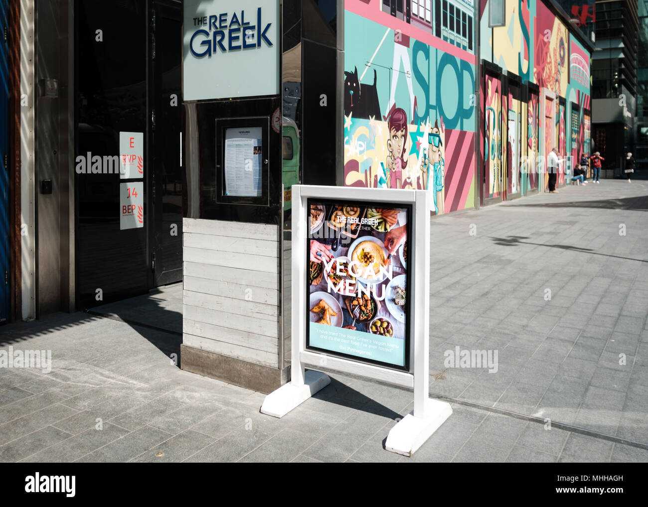 Vegan menu being advertised outside The Real Greek restaurant, Westfield Stratford, East London Stock Photo