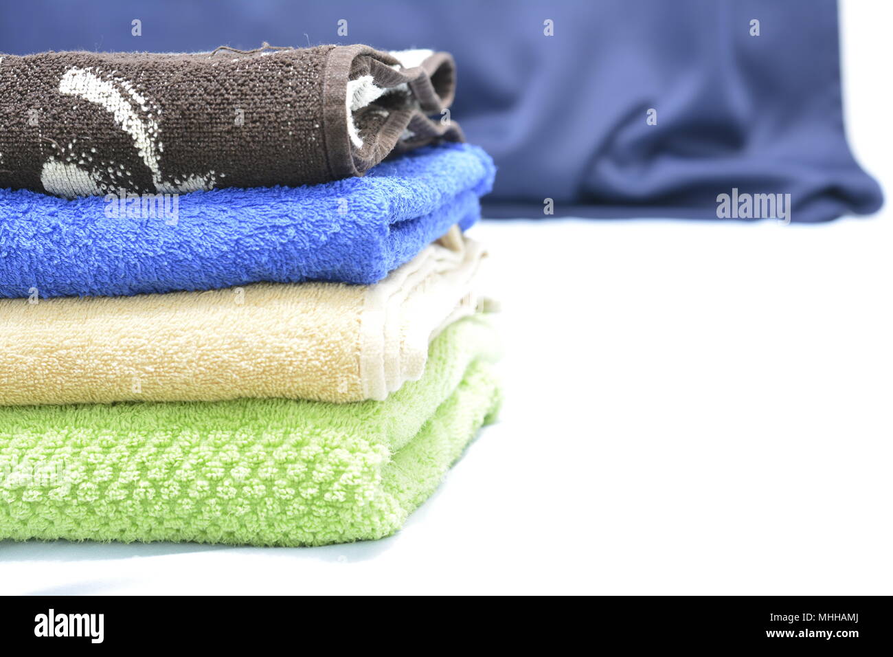 bathroom toiletries, multi-colored towels Stock Photo