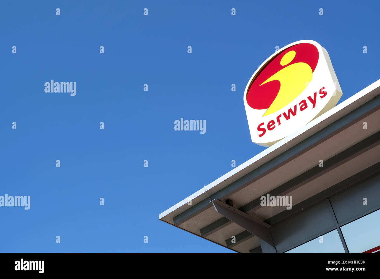 Serways sign against blue sky. Serways is a brand of Tank & Rast, which leases, operates and manages motorway service stations in Germany. Stock Photo