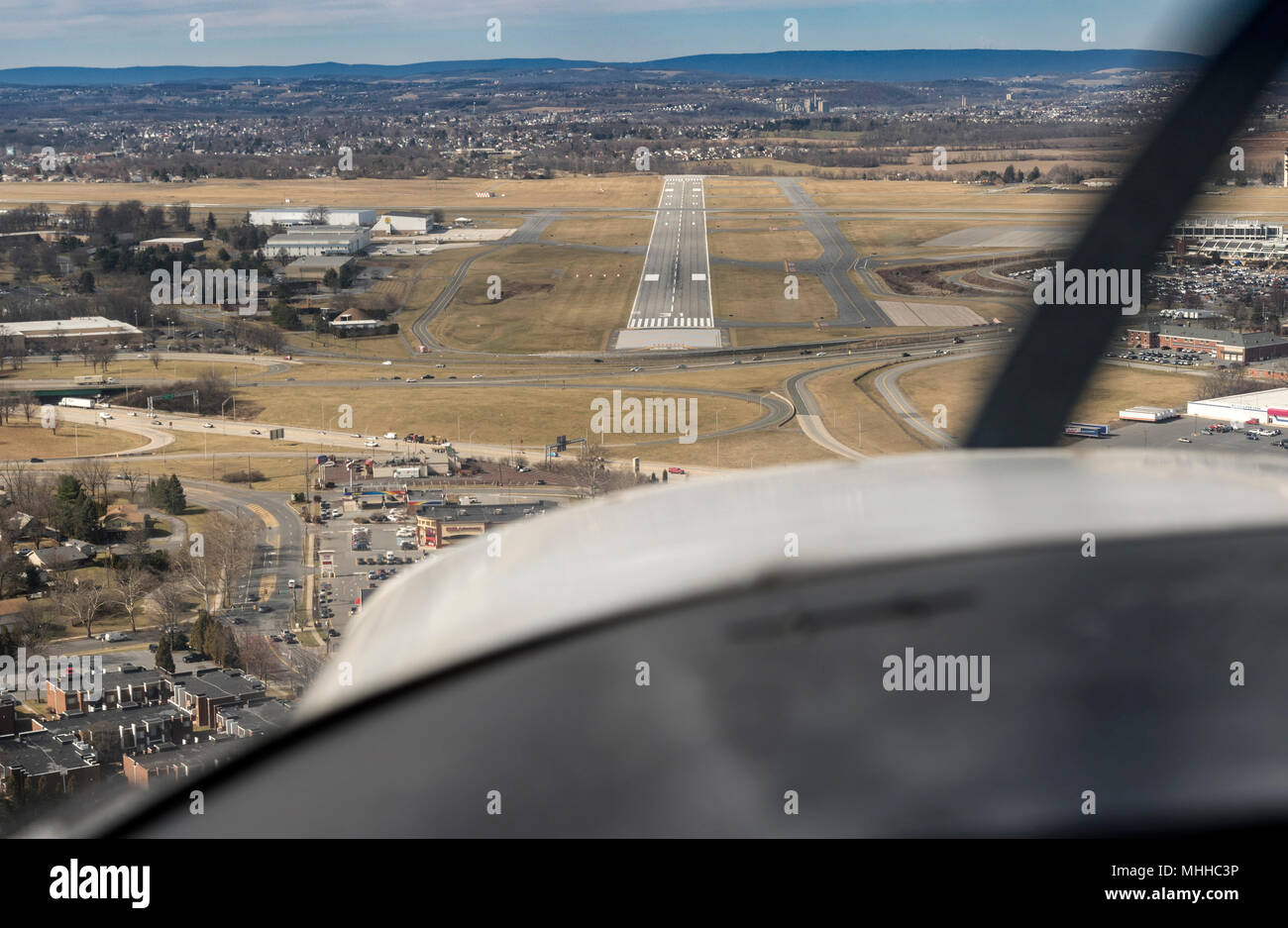 Small Prop Airplane Landing At Allentown Bethlehem Airport, Pennsylvania, USA Stock Photo