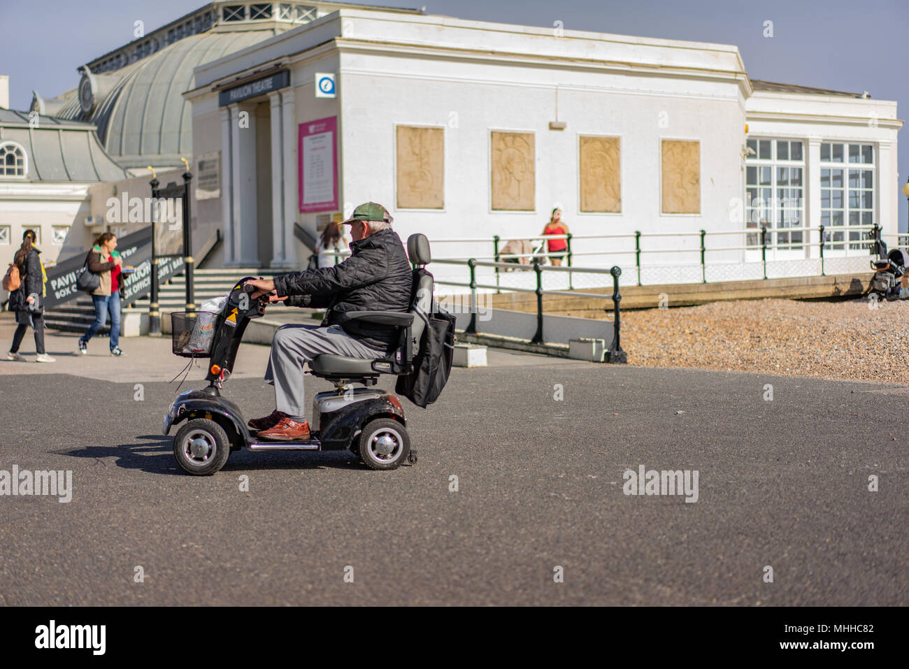 Elderly man on mobility scooter in Worthing Stock Photo Alamy