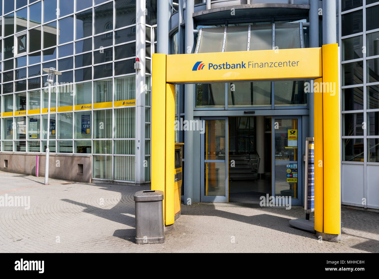 entrance of a Postbank Finanzcenter. Deutsche Postbank is a German retail bank with headquarters in Bonn, Germany. Stock Photo