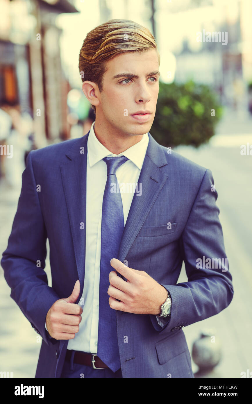 Portrait Of An Attractive Young Businessman In Urban Background