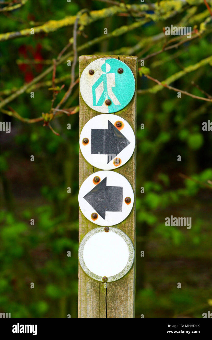 Close up of a direction sign post on a country hike Stock Photo