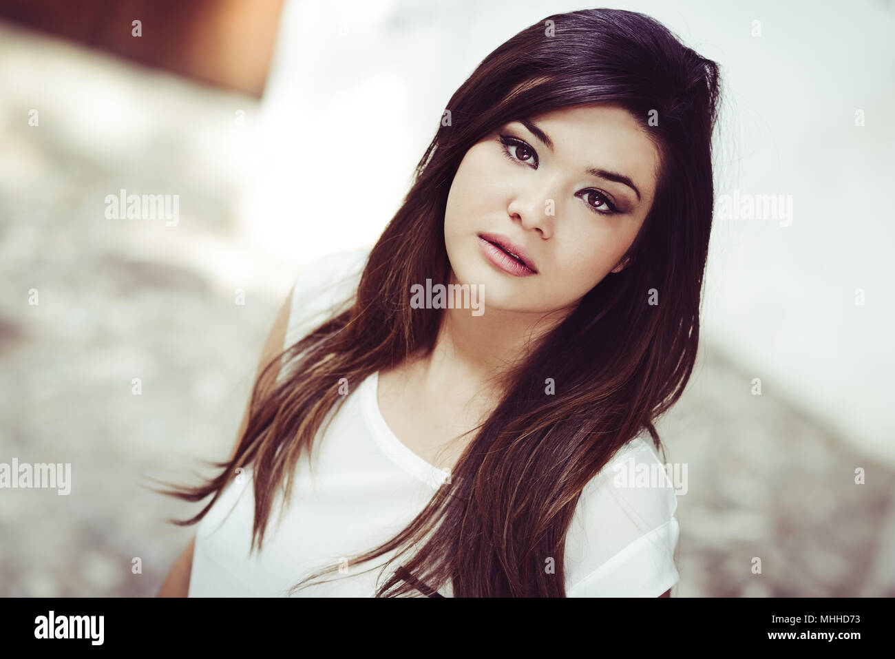 Portrait of beautiful japanese woman in urban background Stock Photo