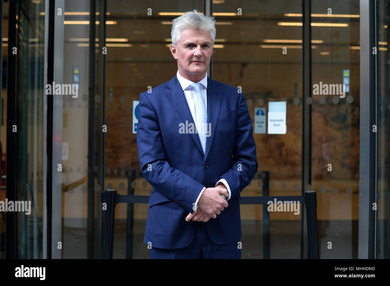 BBC journalist Tim Willcox outside the Rolls Building in London, where he is challenging income tax and national insurance demands made by Her Majesty's Revenue and Customs (HMRC) officials. Stock Photo