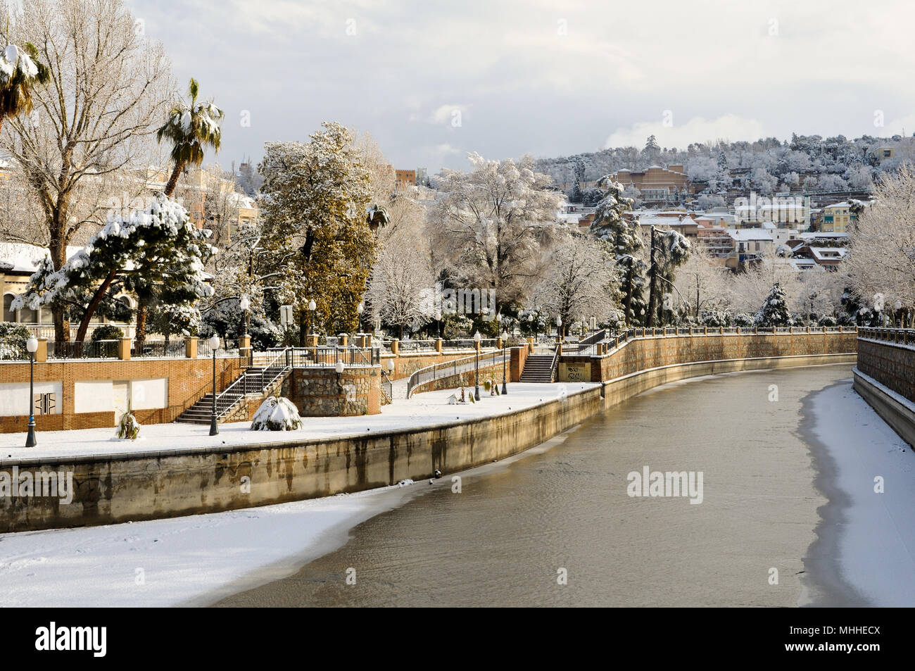 Snow storm with slush on sidewalks. Granada, Andalusia, Spain Stock