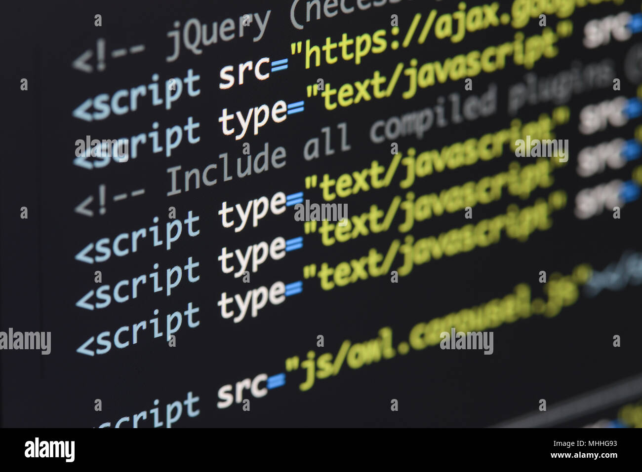 Real Html code developing screen. Programing workflow abstract algorithm concept. Lines of Html code visible. Stock Photo