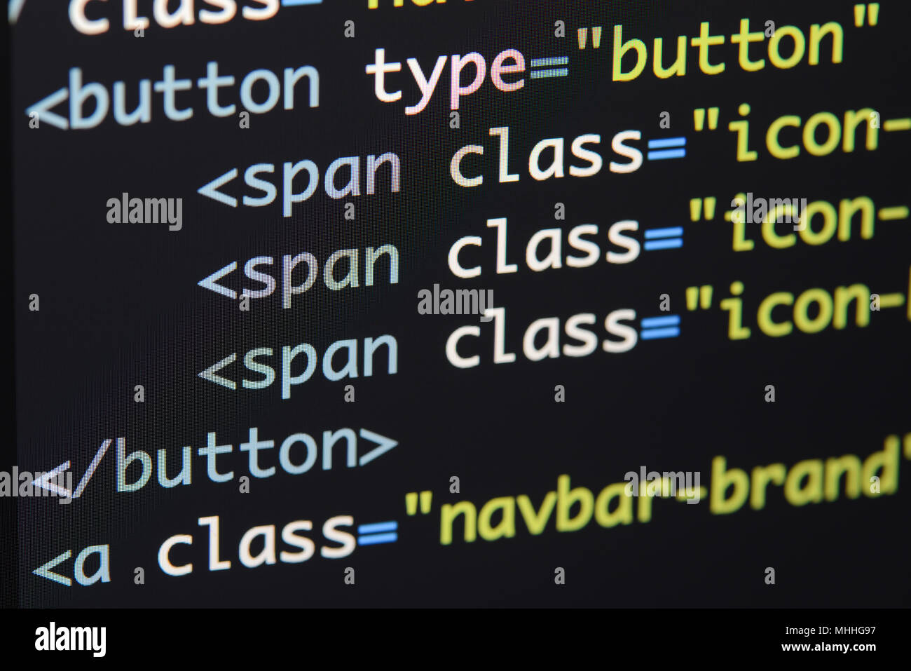 Real Html code developing screen. Programing workflow abstract algorithm concept. Lines of Html code visible. Stock Photo
