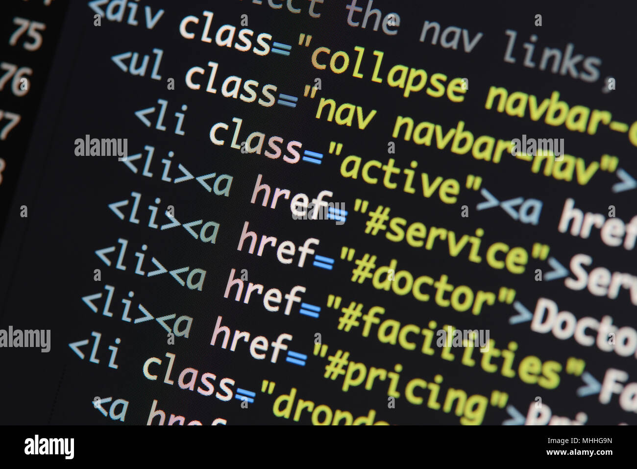 Real Html code developing screen. Programing workflow abstract algorithm concept. Lines of Html code visible. Stock Photo