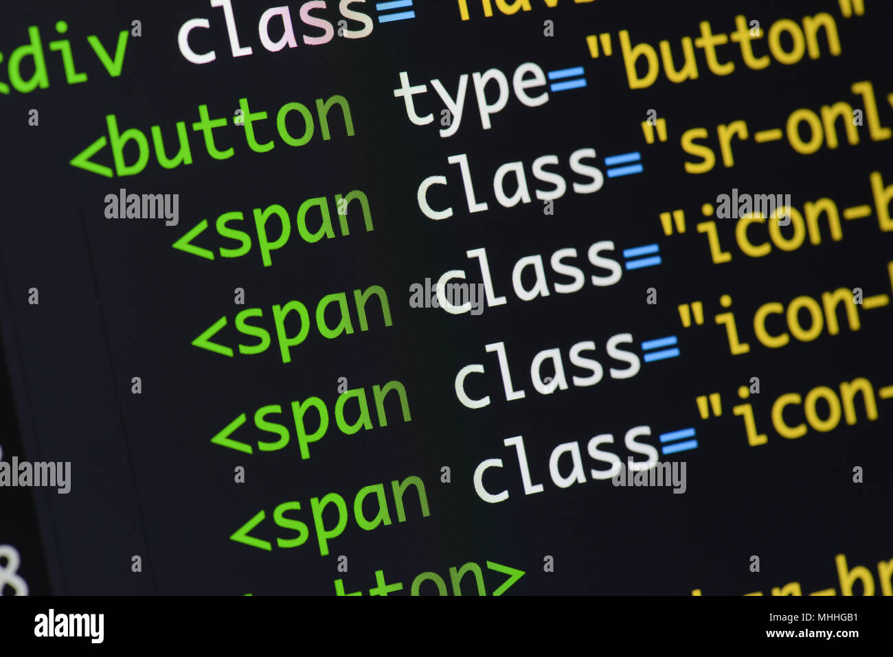 Real Html code developing screen. Programing workflow abstract algorithm concept. Lines of Html code visible. Stock Photo