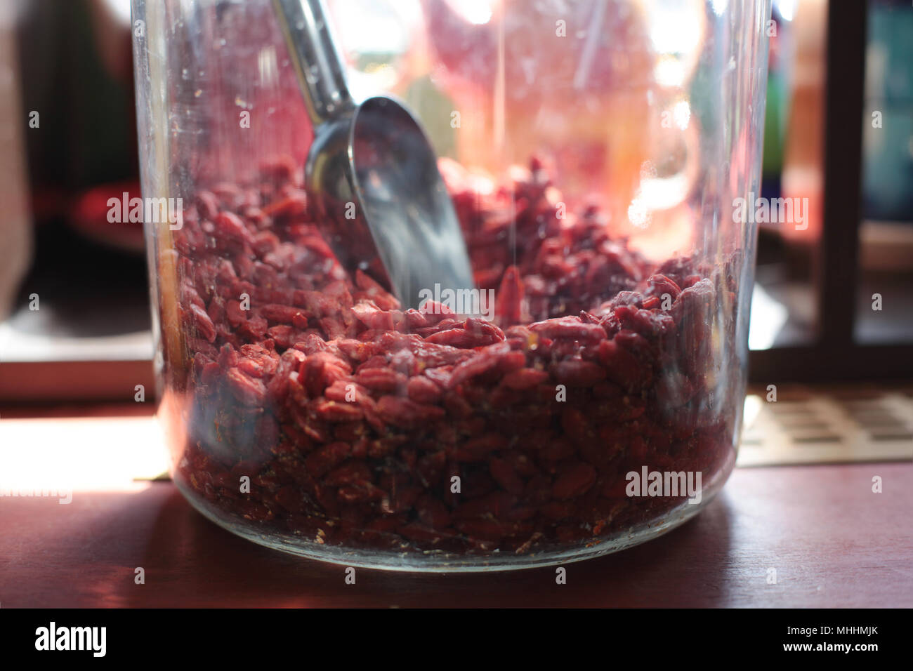 dry goji berry in a jar with a scoop Stock Photo