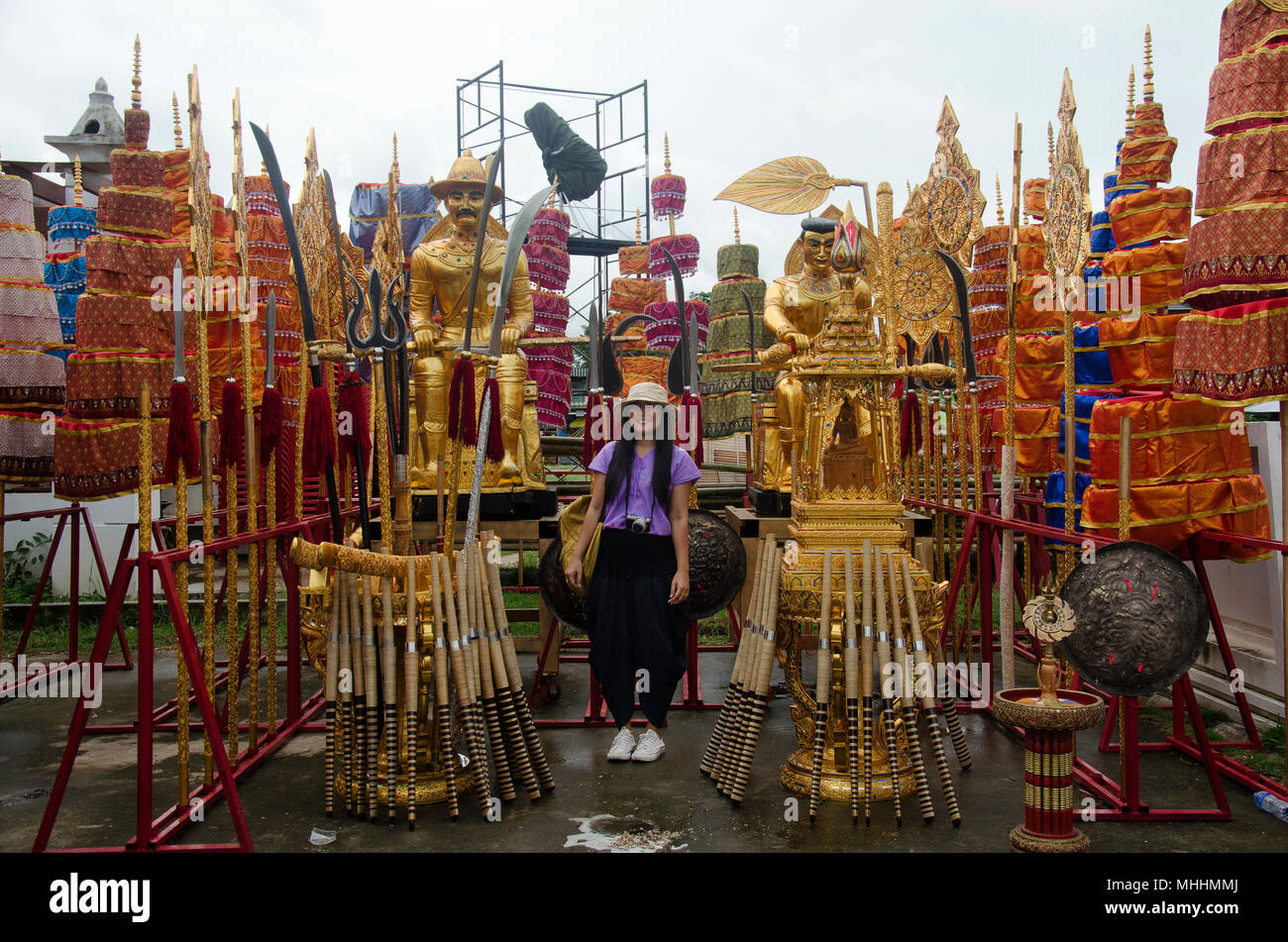 Thai women travelers posing for take photo with thai warrior costume and  theatrical equipment at Wat Phra That Lampang Luang on July 18, 2017 in  Lampa Stock Photo - Alamy